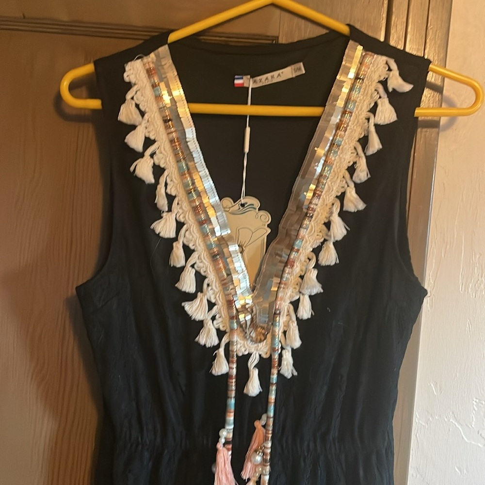 NWT. Black lace Maxi boho dress, tassel and pearl detail. Size small/medium